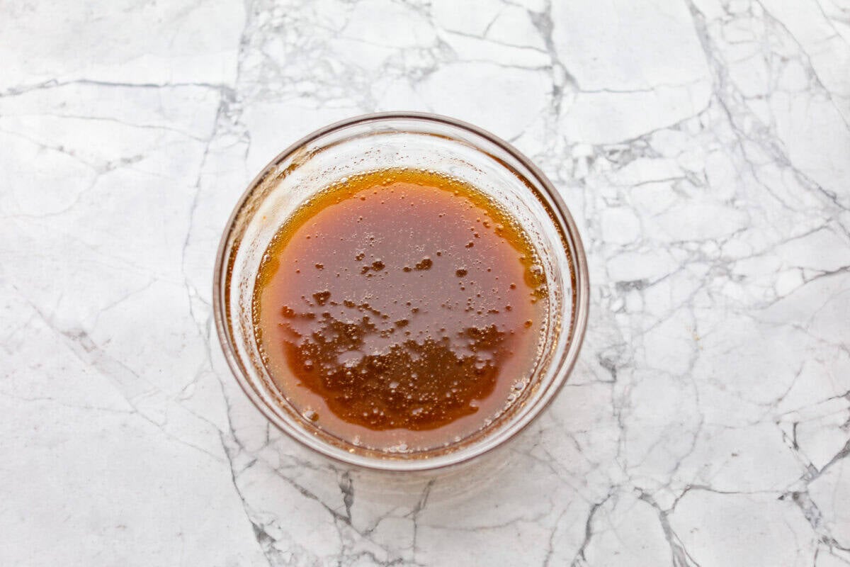 Bowl of maple syrup and brown sugar whisked together. 