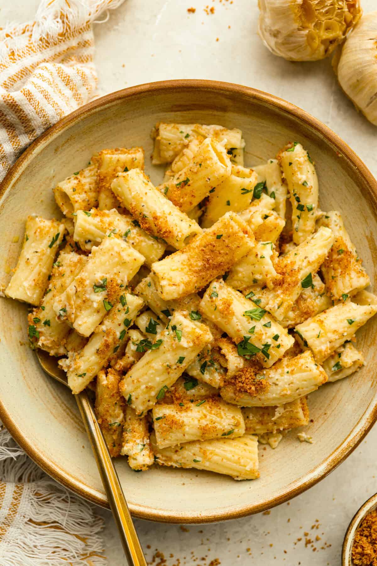 Bowl of a serving size of garlic bread pasta. 