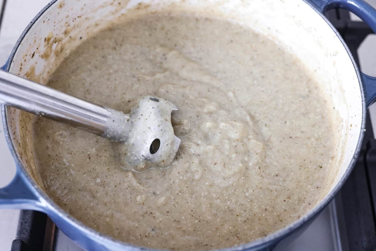 Soup mixed together with an immersion blender. 