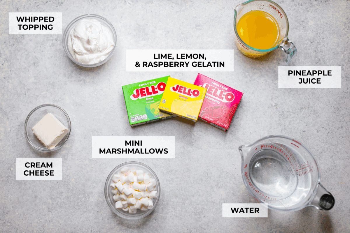 Overhead shot of labeled Christmas ribbon salad ingredients. 