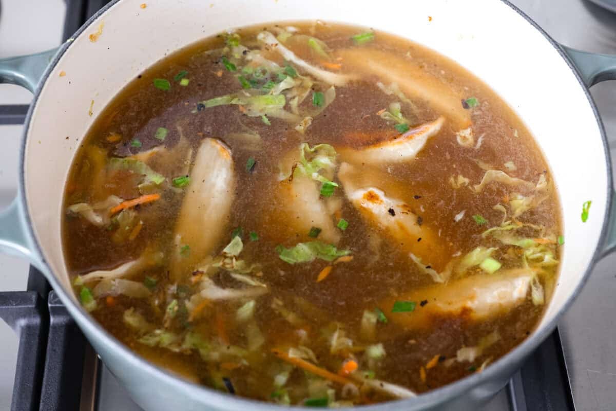 Broth and soy sauce added to the bot. 