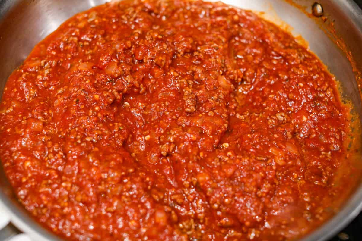 Marinara sauce added to the ground beef and and onion mixture. 
