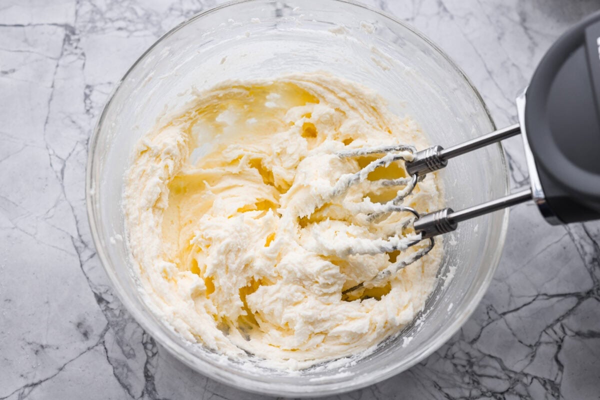 Sugar and butter in a mixing bowl beaten together with a hand mixer. 