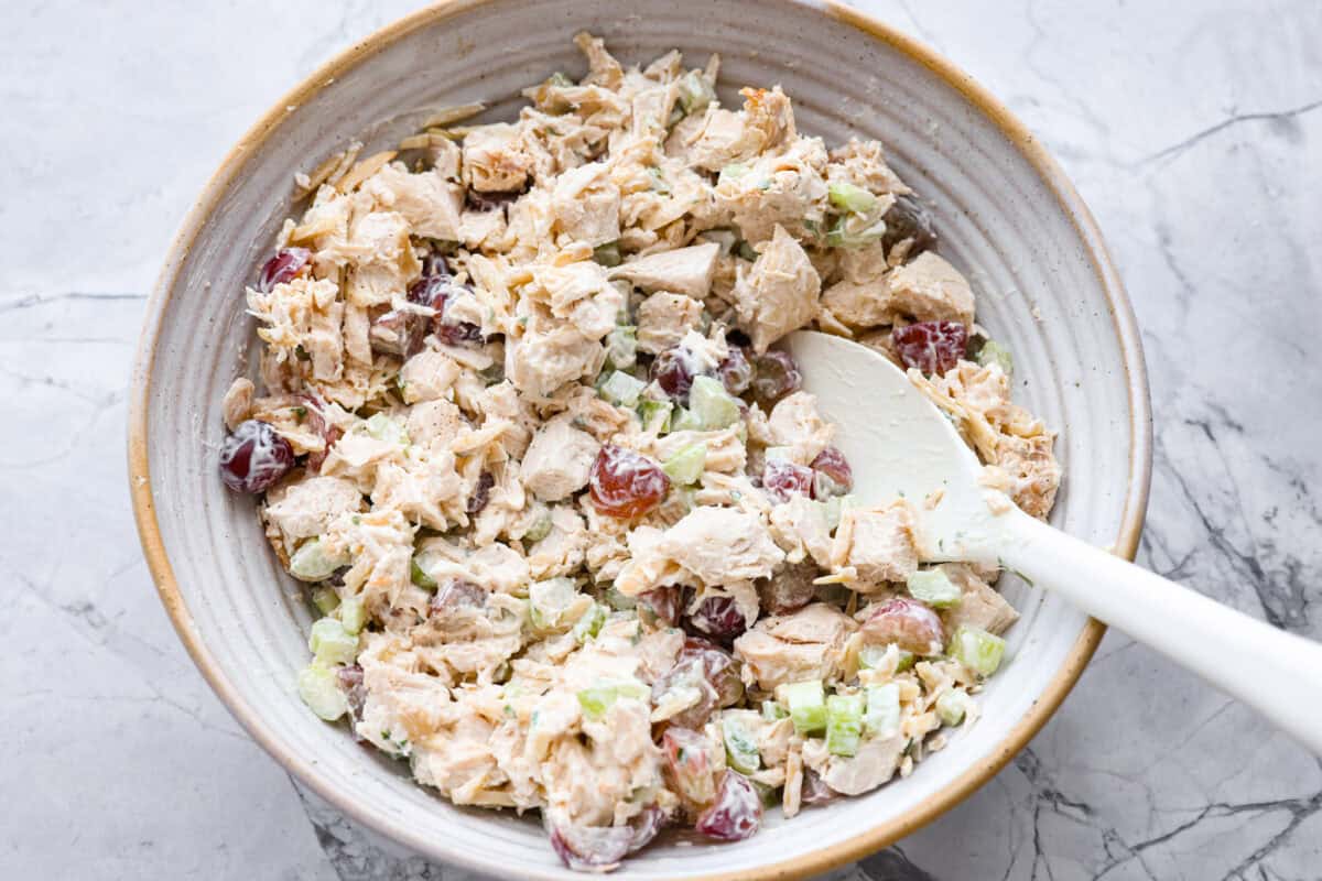 Mayonnaise added to the salad mixture.