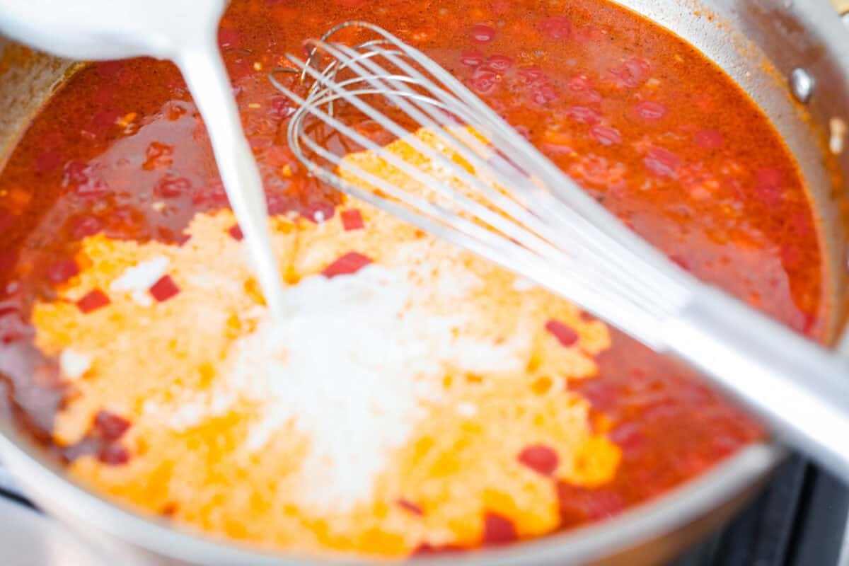 Someone whisking in the heavy cream. 