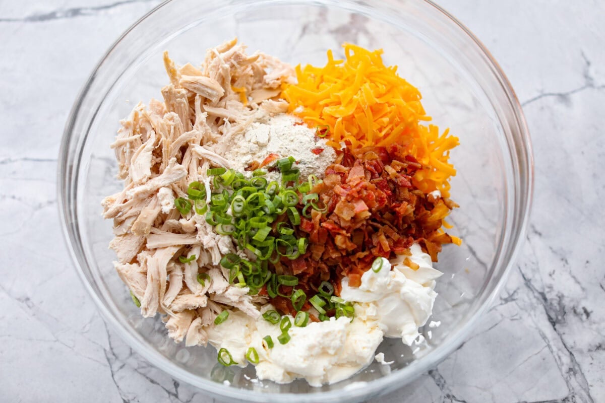 crack chicken ingredients all added to a mixing bowl. 