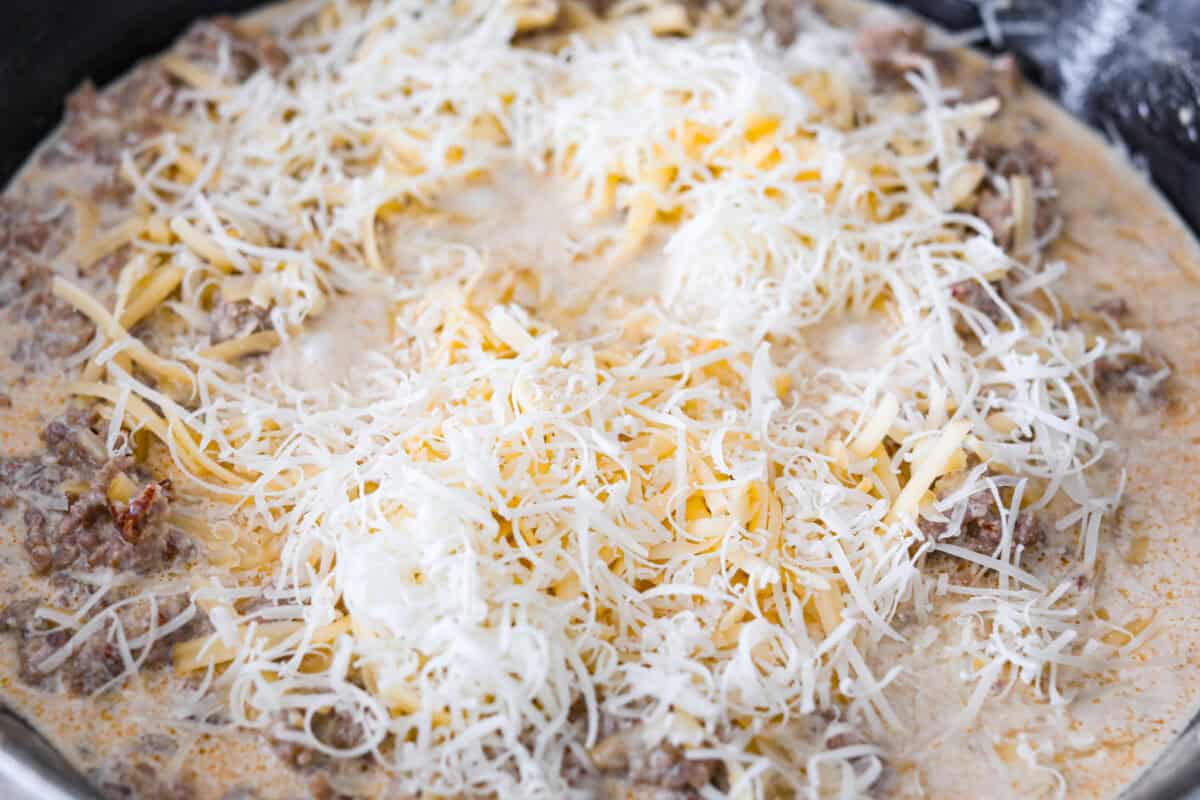 If you love a creamy pasta with big flavor, this creamy sausage spaghetti needs to be on your menu. Smoked Gouda adds depth, the sausage brings a little heat, and fresh basil adds brightness. Simple ingredients, quick to make, and always a hit! Cheese added to the sausage mixture.