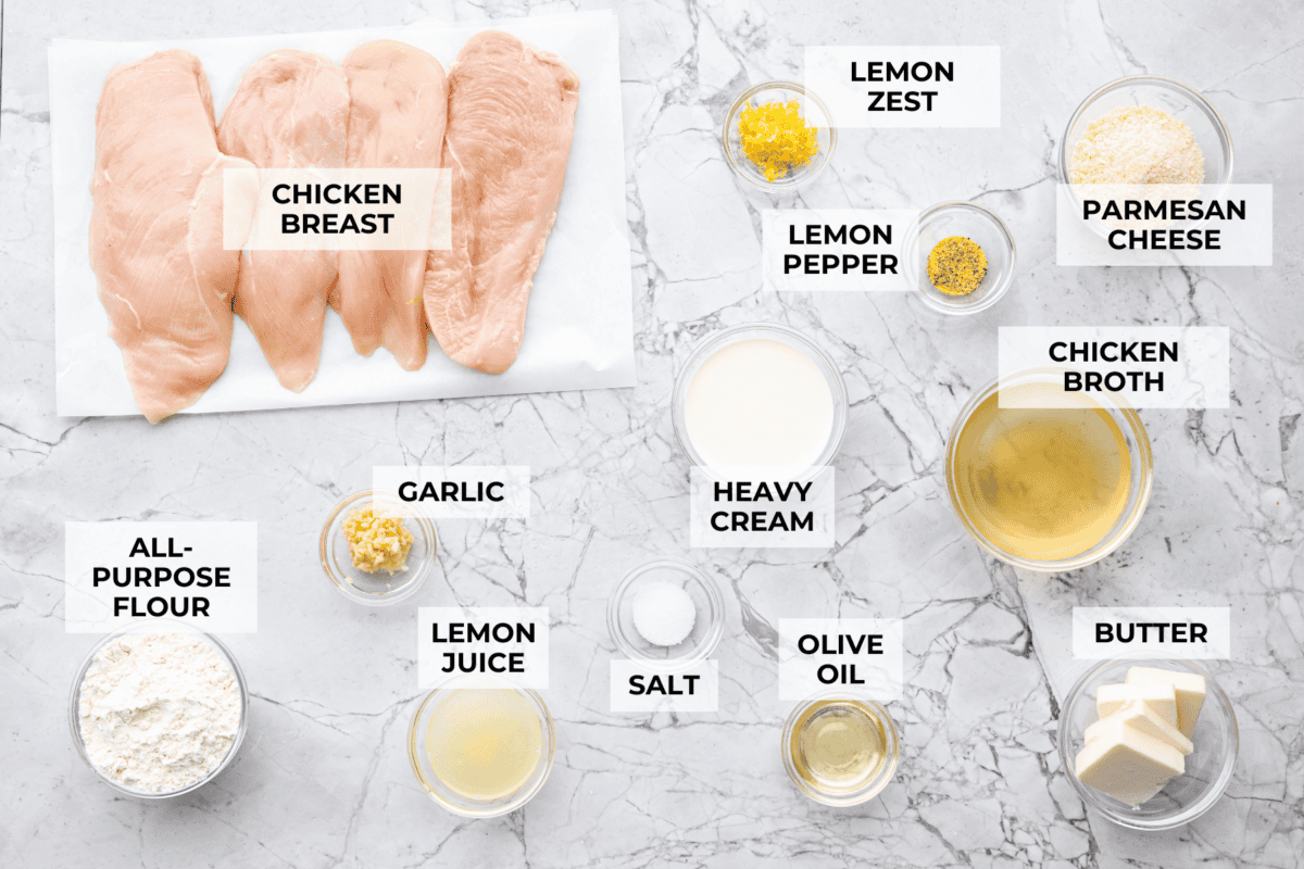 This lemon butter chicken is about to become your new weeknight secret weapon. One skillet, simple ingredients, and less than 30 minutes to the most golden, saucy, creamy chicken you've ever made. Overhead shot of labeled lemon butter chicken ingredients.