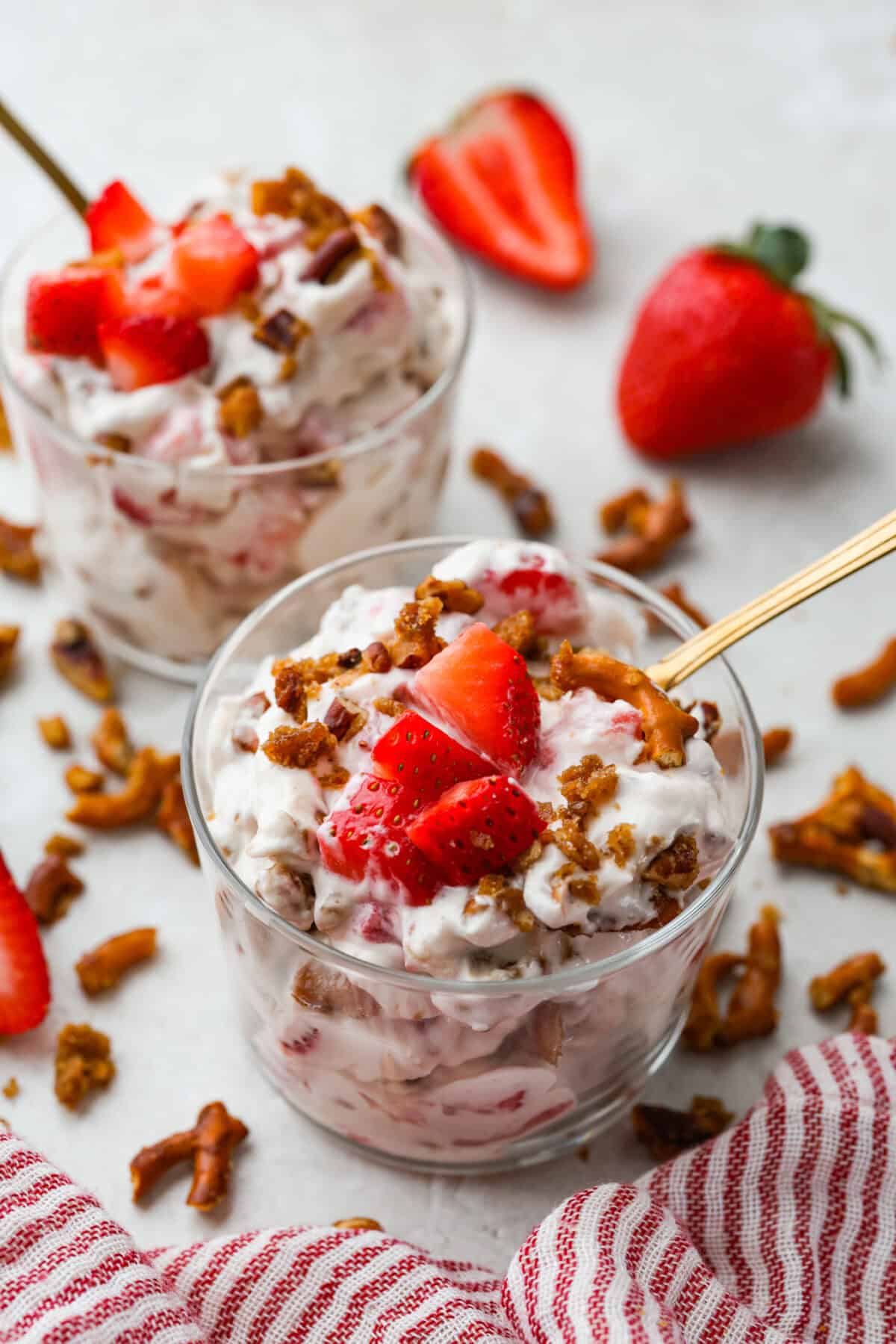 Serving bowls of crack pretzel salad. 